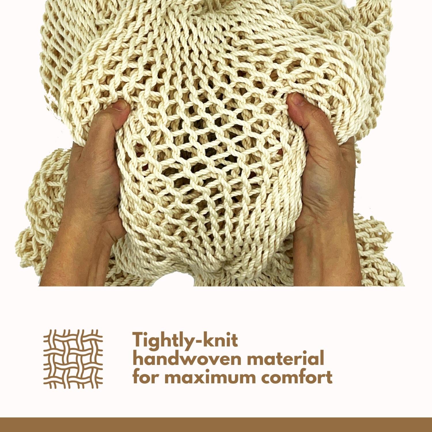 A close-up image of a hammock swing in beige colour. Tightly-knit handwoven material for maximum comfort.