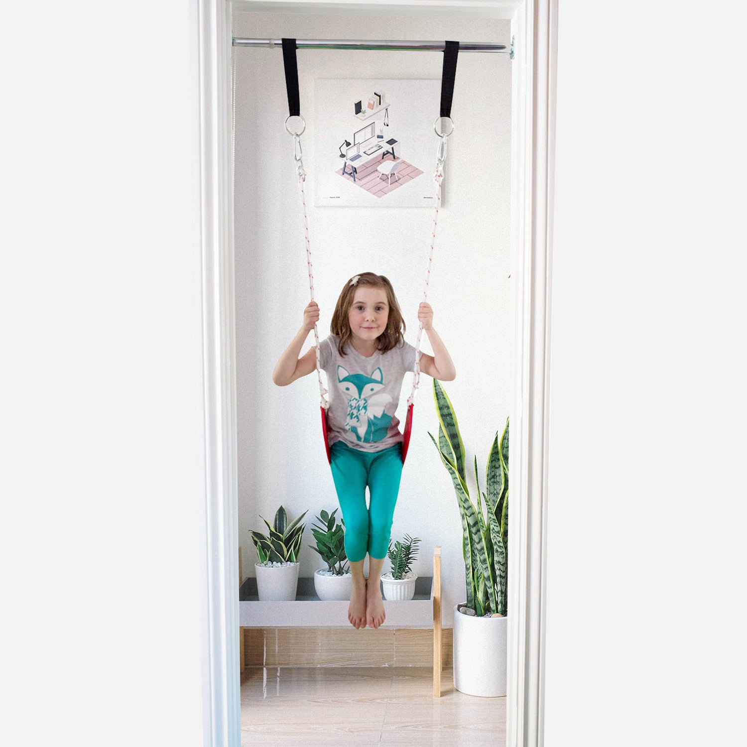 A girl is using doorway swing