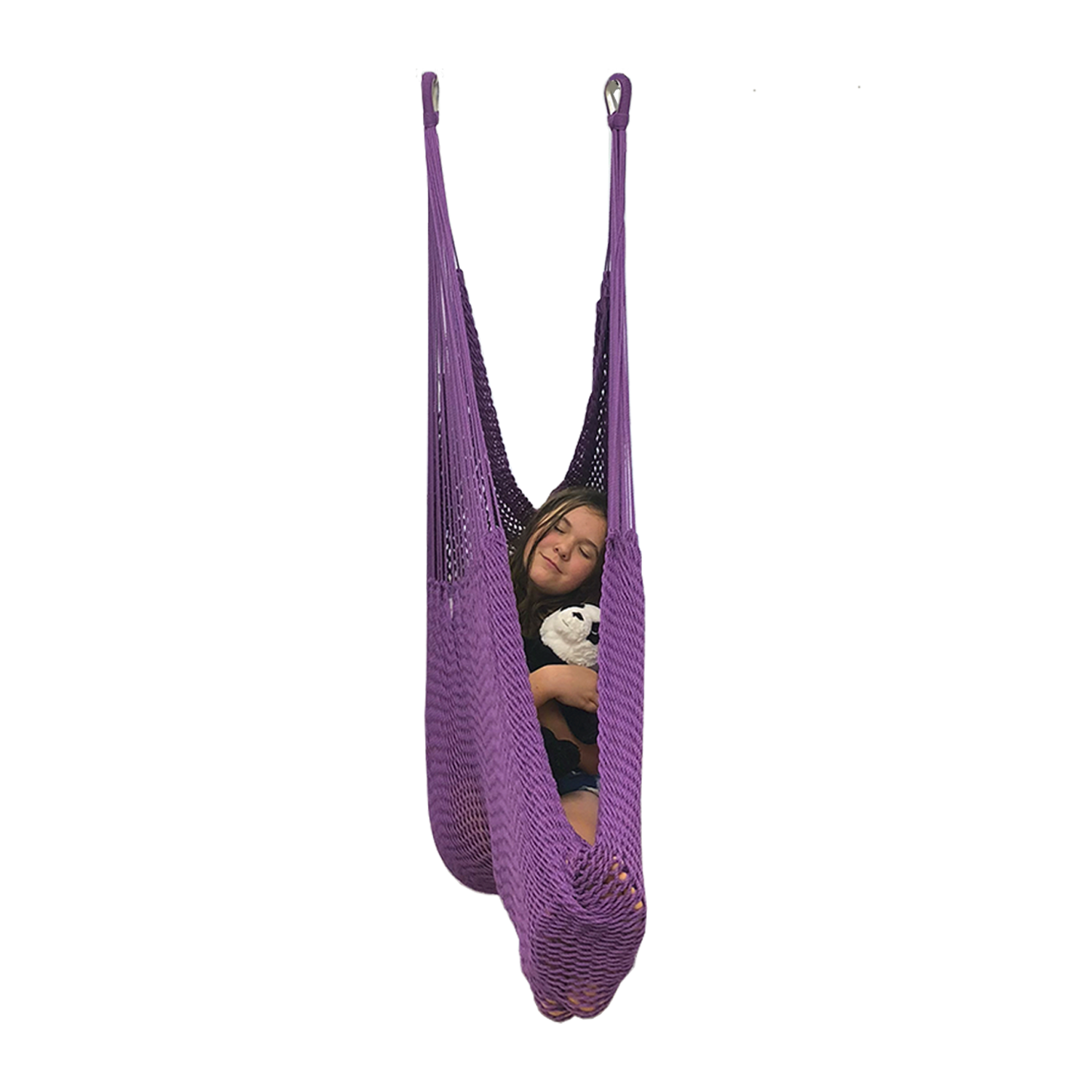 A girl is resting in a purple hammock swing with her plush toy panda bear.